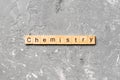 Chemistry word written on wood block. Chemistry text on cement table for your desing, concept