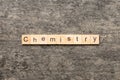 Chemistry word written on wood block. Chemistry text on cement table for your desing, concept