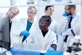 Chemists biologists conducting medical analysis