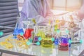 Chemists work lab in morning, With sun shining through, With test pieces working with colorful liquid chemicals, Glass tubes, and