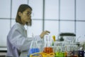 Chemists work lab in morning, With test pieces working with colorful liquid chemicals,Glass tubes, for cosmetics,develop safe reci