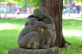 Chemnitz, Germany - June 12, 2023: Sitting mother with child, a 1974 sculpture by Ingeborg Hunzinger in Stadthallenpark