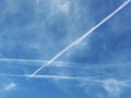 Chems chemtrails aeroplane geoengineering chemical trails vapour plane jet fuel sky skies pollution air climate change Royalty Free Stock Photo