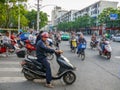 Chengdu city street, Chinese traffic jams at the crossroads, people on motobikes Royalty Free Stock Photo