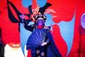 Chengdu, China - July 26, 2019: Face-changing Szechuan Chinese opera theater stunt performance in Chengdu China
