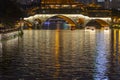 Illuminated bridge reflected in the river in Chengdu, China. Royalty Free Stock Photo