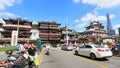 Chenghuangmiao street with travelers and pagoda style buildings