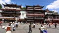 Chenghuangmiao street with travelers and pagoda style buildings