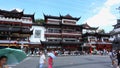 Chenghuangmiao street with travelers and pagoda style buildings