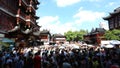 Chenghuangmiao street with travelers and pagoda style buildings