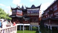 Chenghuangmiao street with travelers and pagoda style buildings