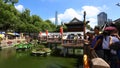 Chenghuangmiao street with travelers and pagoda style buildings