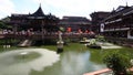 Chenghuangmiao street with travelers and pagoda style buildings