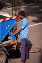 Chennai, Tamil Nadu, India - Nov 28 2020: Chennai City Metro water supply and sewage board worker cleaning up the underground