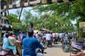 Indian people crowd on road traffic near railway gate