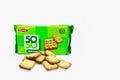 Closeup view of Britannia 50-50 Sweet & Salty Cookies in a green cover pack with copy space green