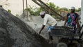 construction worker. Cement or mortar, Cement powder with a trowel put on the brick