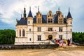 CHENONCEAU, FRANCE - CIRCA JUNE 2014: Outside view of the castle and tourists Royalty Free Stock Photo