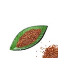 Chenopodium quinoa - Red organic quinoa seeds in leaf shaped bowl Royalty Free Stock Photo