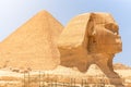 Cheops Pyramid and Great Sphinx of Giza Royalty Free Stock Photo