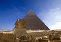 Cheops Pyramid And Sphinx In Giza Royalty Free Stock Photo