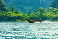 Long Tail Boat Cheow Lan Lake Khao Sok National Park Thailand. Mountain scenery on tropical lake landscape