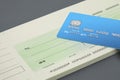 Cheque book and a blank cheque Royalty Free Stock Photo