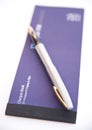 Cheque book and pen. Royalty Free Stock Photo
