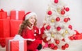 Cherished holiday activity. Child enjoy family tradition. Christmas eve concept. Join christmas celebration. Girl