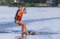 Cherkassy, Ukraine - July 19, 2019: Wakeboarder boy showing of tricks and skills at wakeboarding event in Cherkassy