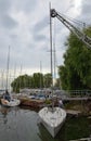 Yacht descends into water by crane. Royalty Free Stock Photo