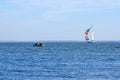 Sailing yachts on the Dnieper river on a sunny day. Sailing boat trip. Travel Ukraine