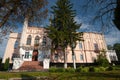 Staircase and entrance door, coquina towers, west facade in the sun, Cherniatyn, Ukraine