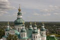 Chernigov, Ukraine. August 15, 2017. Christian orthodox white church with green domes and gold crosses. View from high. Calm sky Royalty Free Stock Photo