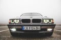 Chernigov, Ukraine - January 6, 2021: Old car BMW 7 Series E38 on the road against a background of fog. Gloomy weather. Bmw and Royalty Free Stock Photo