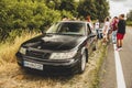 Chernigov, Ukraine - July 24, 2021: Saab 9-5 car on the background of people. Saab car on the road