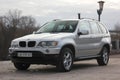 Chernigov, Ukraine - November, 2017. Gray off-road car BMW X5. A private car parked on the sidewalk.