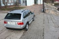 Chernigov, Ukraine - November, 2017.Gray off-road car BMW X5. A private car parked on the sidewalk