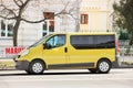 Chernihiv, Ukraine - March 31, 2020: Yellow Renault Traffic minivan stands at a traffic light in the city