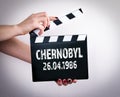 Chernobyl 26.04.1986. Female hands and movie clapper