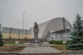 Chernobyl nuclear power plant building with monument