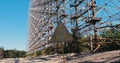 Chernobyl, radiation sign near the military radar Dug. Giant antenna of the cold war of the USSR. Ukraine.