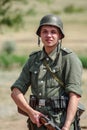 Historical reenactor in the uniform of a soldier of the German army during the Second World War Royalty Free Stock Photo