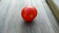 Cherrie tomato on a piece of wood
