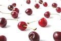 Cherries arranged on a white background