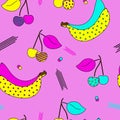 Cherries and banana seamless pattern in pop art style. Abstract colorful fruit print. Royalty Free Stock Photo
