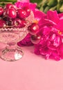 Cherries in the beautiful crystal vase with peony