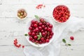 Cherries in a bowl on a wooden table Royalty Free Stock Photo