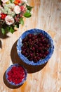 Cherries and candied cherries in porcelain bowls Royalty Free Stock Photo
