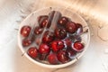 Cherries , cherry washing under water in a bowl , closeup